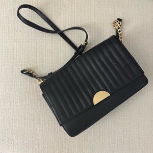 Target Black Crossbody Bag with Gold Accents